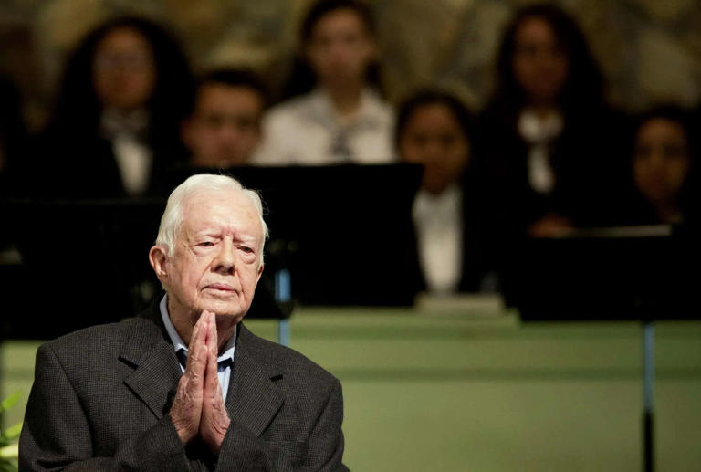 Jimmy Carter’s Funeral Procession Traces 100 Years from Humble Georgia Roots to Global Impact